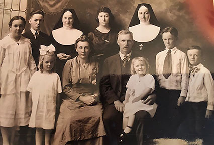 Alice Montgomery is the youngest in this family photo, sitting on her father’s knee.