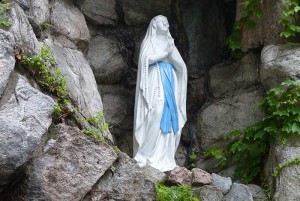 The grotto is a replica of the one in Lourdes, France.